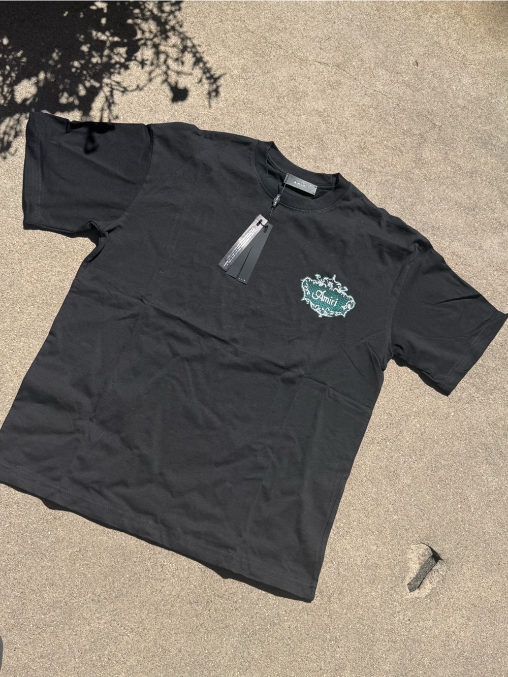 AMIRI Black T‑Shirt with Teal Crest Logo